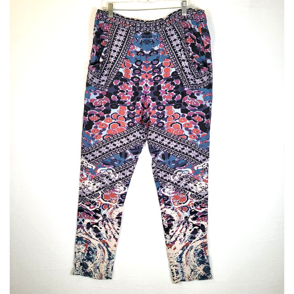 Free People Womens Pull On Printed Skinny Pants Size Medium Purple Pockets Boho - Picture 1 of 9
